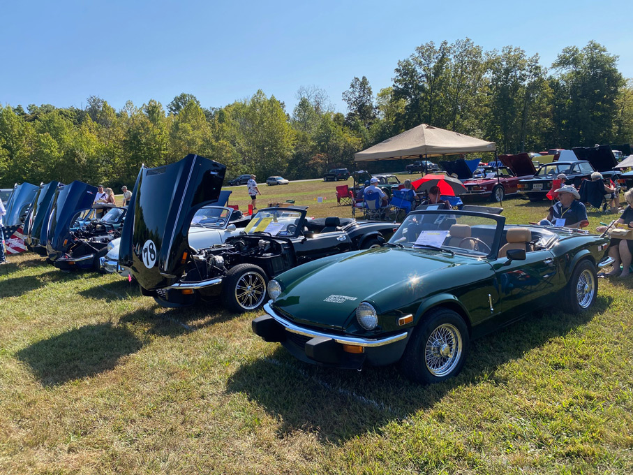 Triumph Spitfires on display at 2024 VTR Convention Car Show, Brown County Park, IN